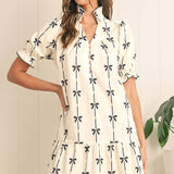 Női trapéz ruha – Természetes szálak – Puffos ujjak – Csomóminta – Térd feletti szabású