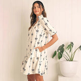 Női trapéz ruha – Puffos ujjú – Természetes rost – Masni motívum – Rövid